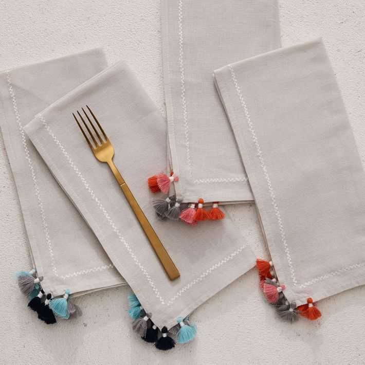 TILLI craftsmen personalize your linens with tassels