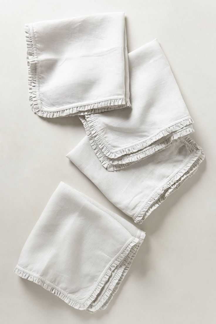 TILLI seamstresses personalize your table linen by adding ruffles.