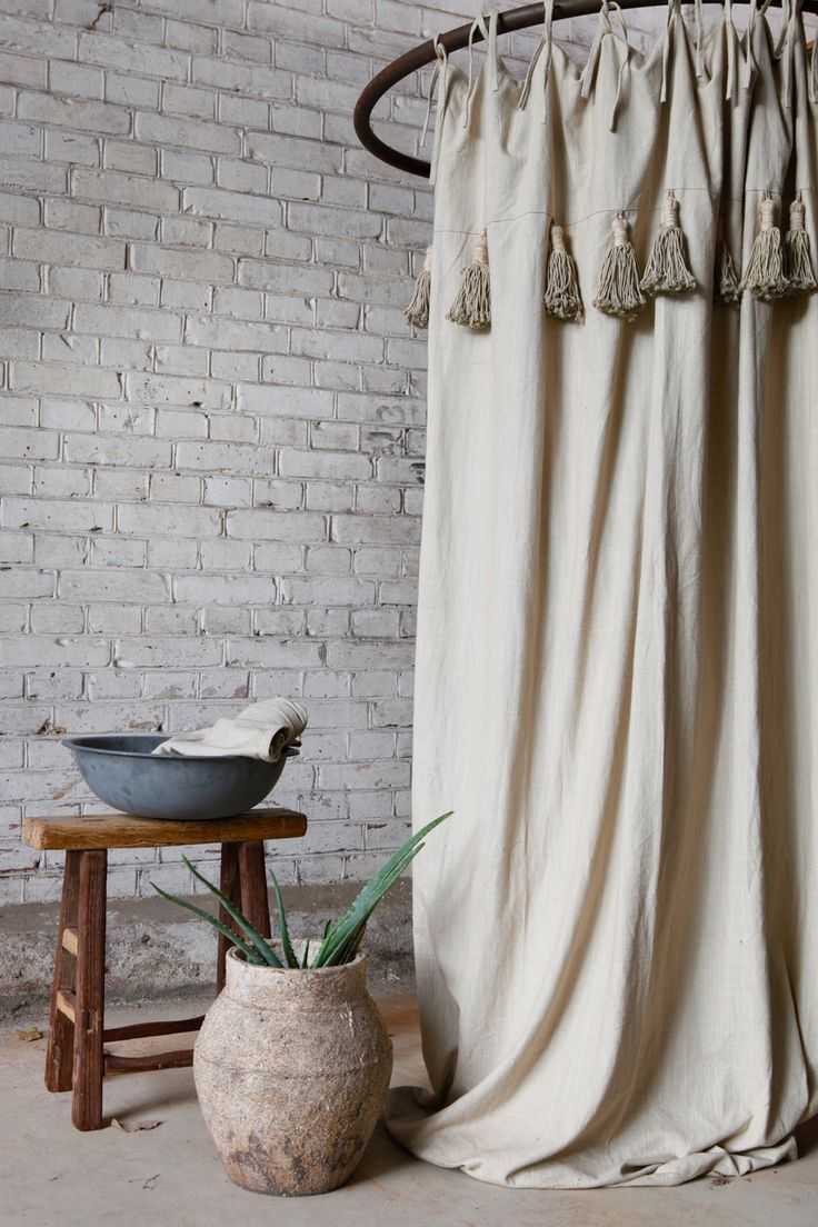 TILLI craftsmen customize your curtains with pompons