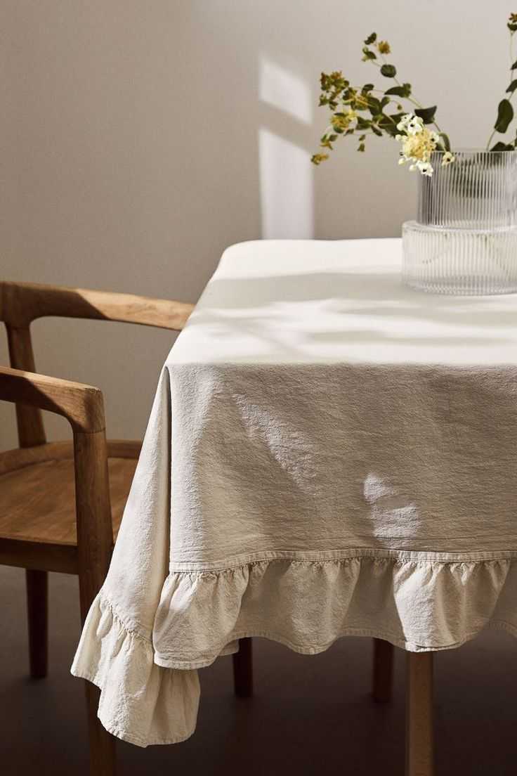 TILLI seamstresses personalize your table linen by adding ruffles.